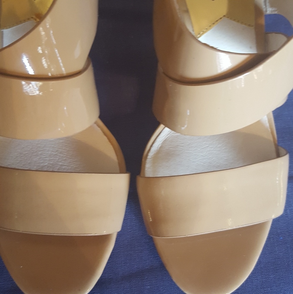 Michael Kors Joselle nude patent leather sandals.